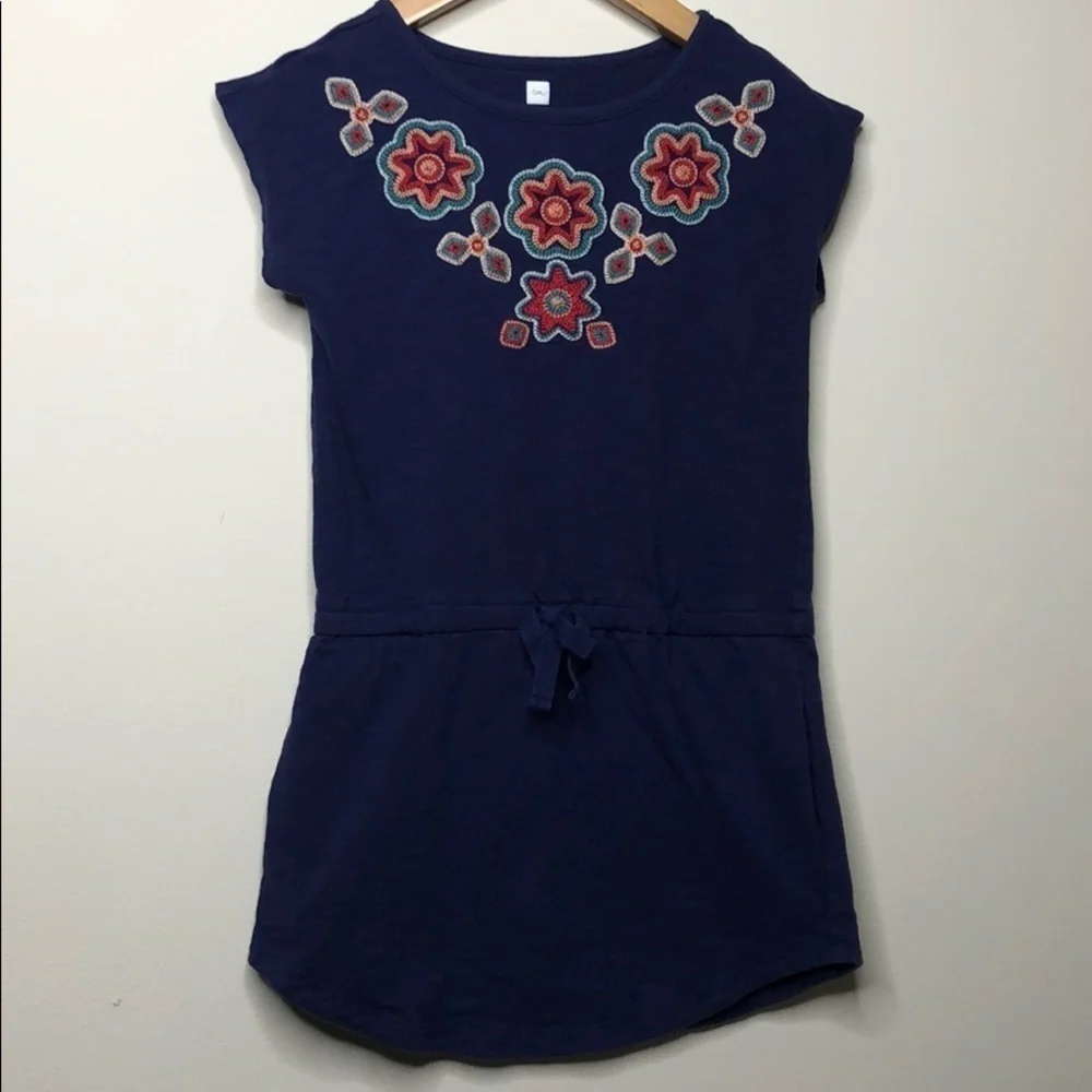 Girls Tea dress with side pockets.
